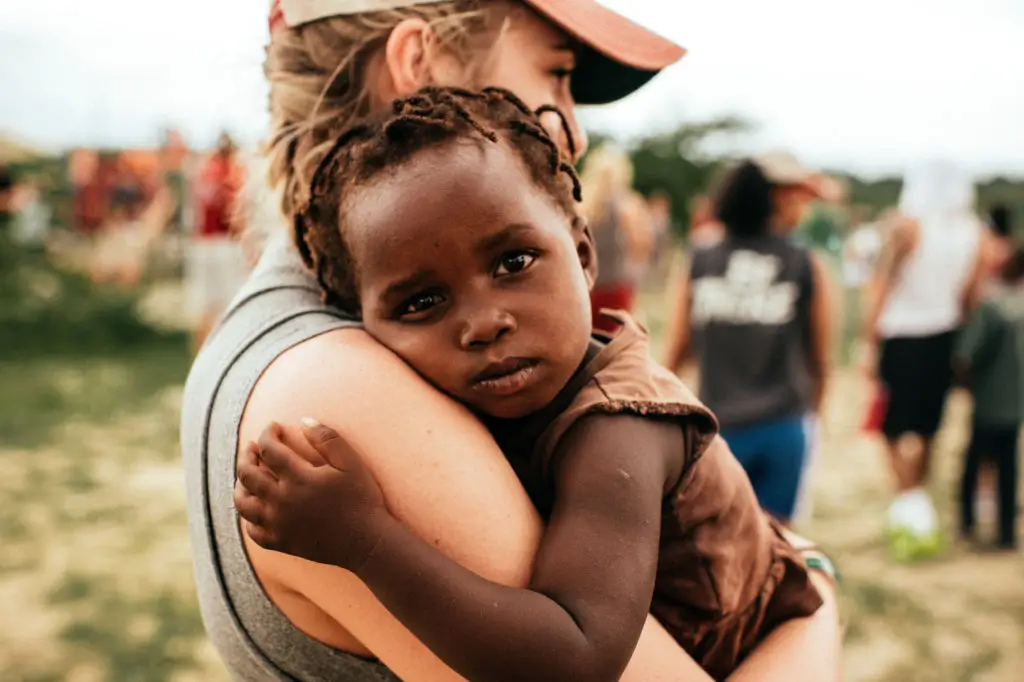 woman holding a child