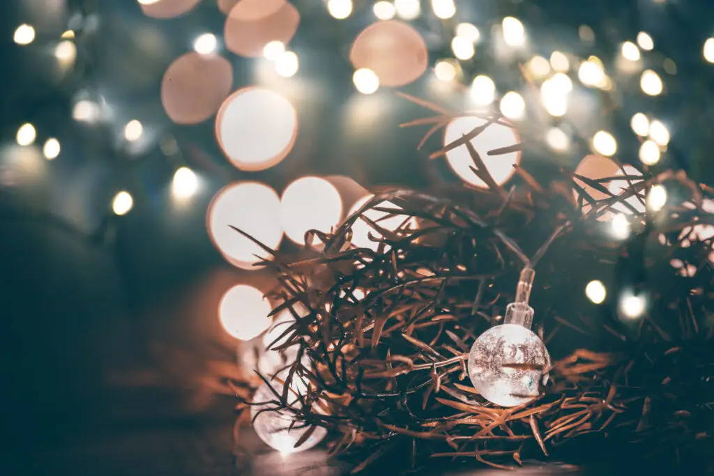 Christmas moody style background with candy jar and Christmas decoration on sparkling lights